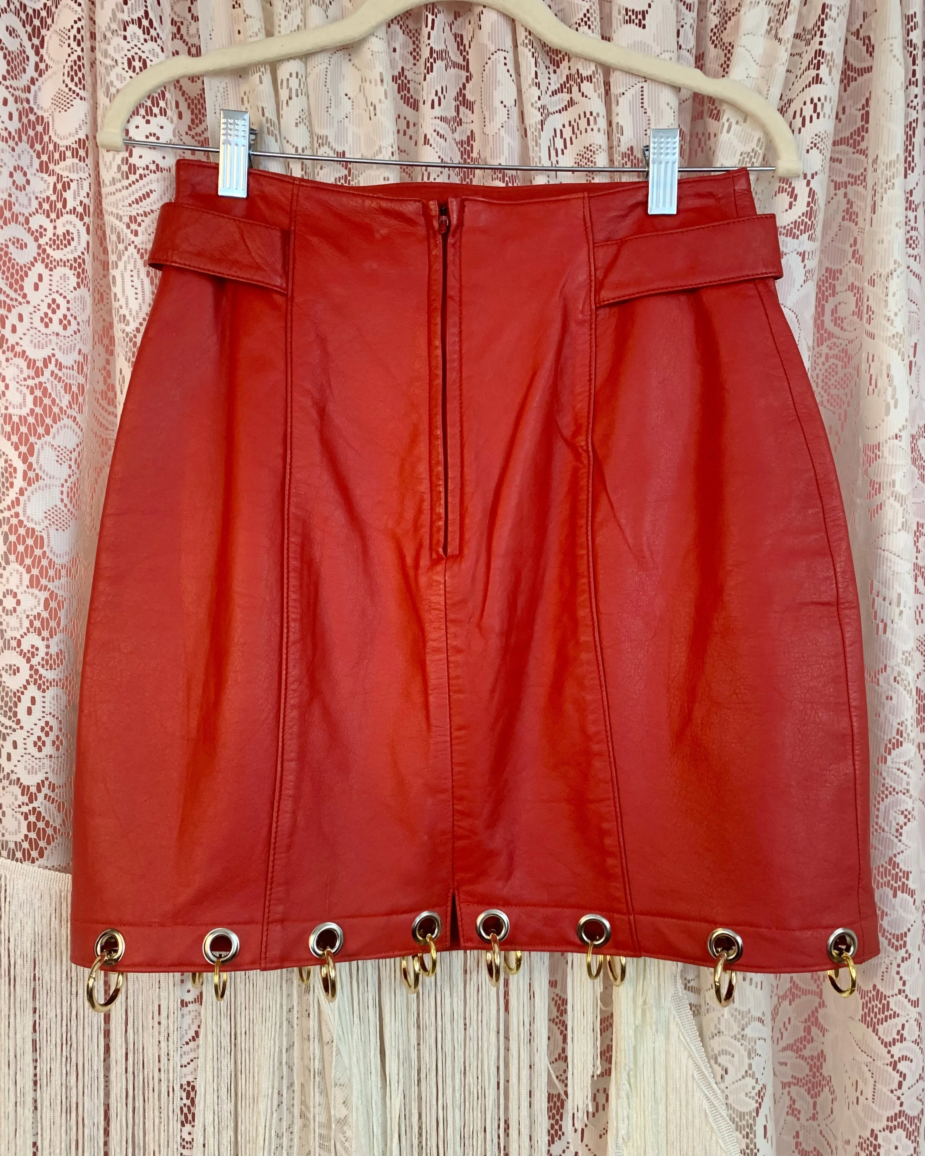 Upcycled grommet ring leather skirt sample